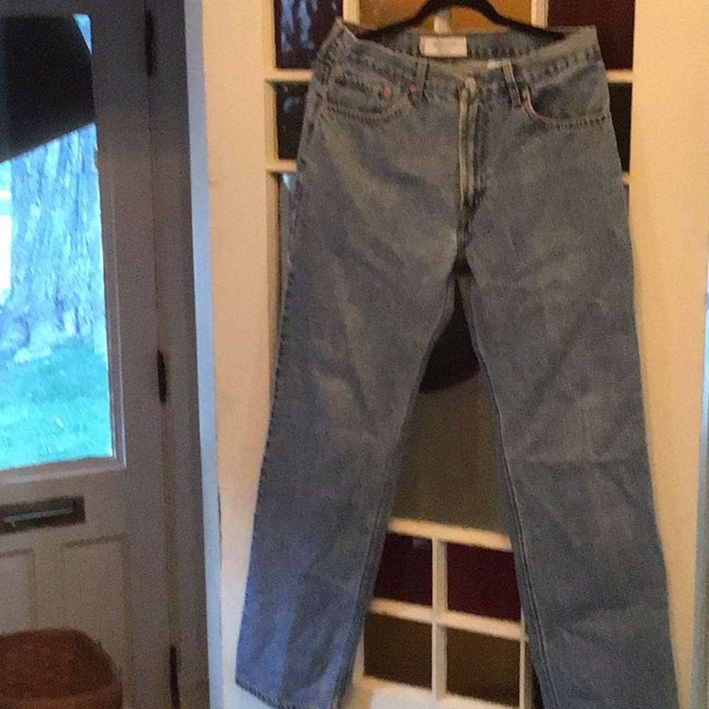 Mens Levi’s 550, red tags jeans.
